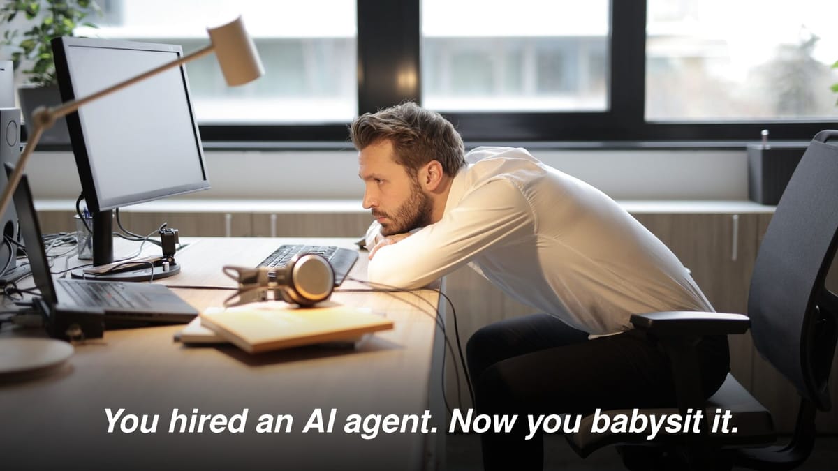 A drained worker slumped over his desk staring at a screen, captioned "You hired an AI agent. Now you babysit it."
